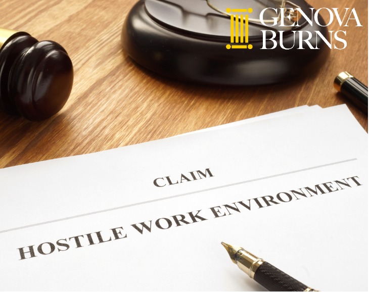 hostile work environment claim document on desk with pen and gavel